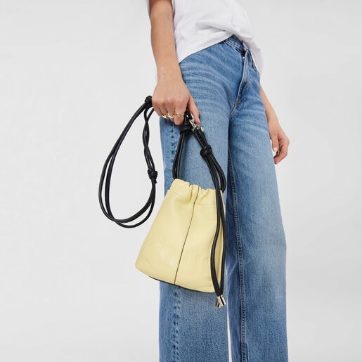 イエローのレザー製ミニバッグ TOUS Cloud