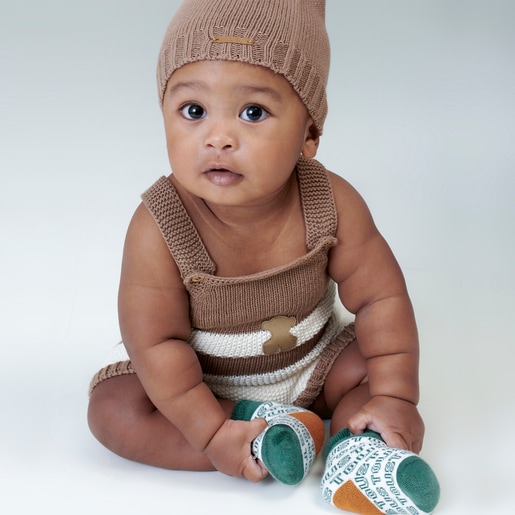 Knitted baby romper in Tricot stripy beige