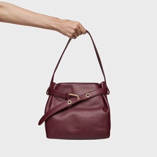 バーガンディーカラーのミディアム・レザーショルダーバッグ TOUS Hold