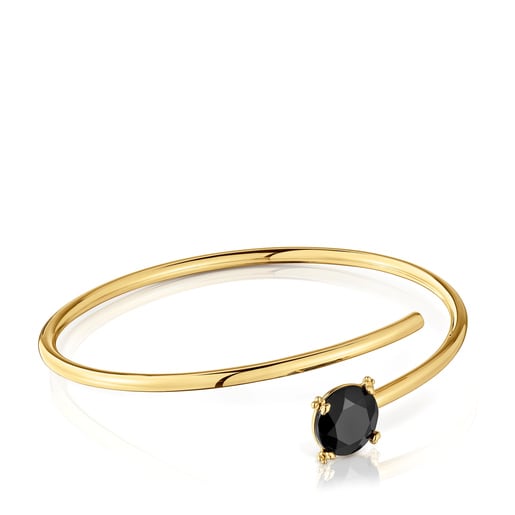 Open bracelet with 18kt gold plating over silver and onyx Cachito Mío