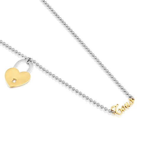 عِقد طويل من الصُلب مُرصّع بتميمة على شكل قلب بدرجتَي لون من تشكيلة TOUS Charming