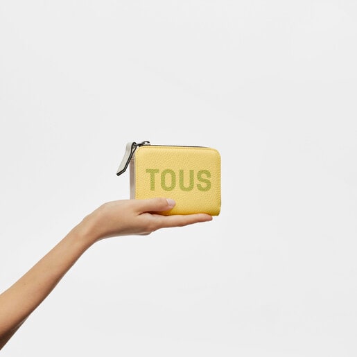 Żółty skórzany portfel TOUS Logo Lynn
