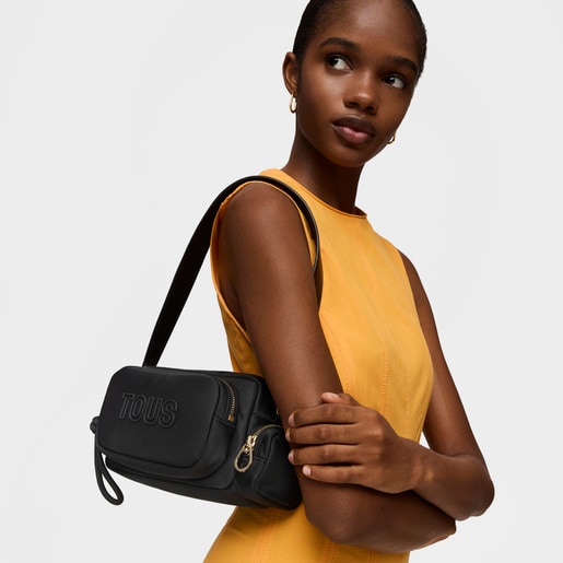 ブラックのクロスボディ・レポーターバッグ TOUS Roomy