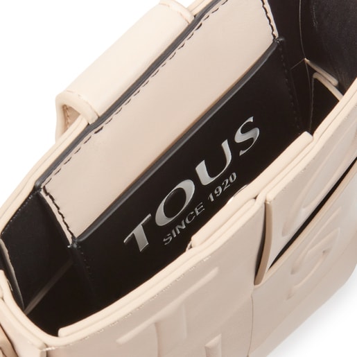 Mini bolso beige y negro TOUS Damas