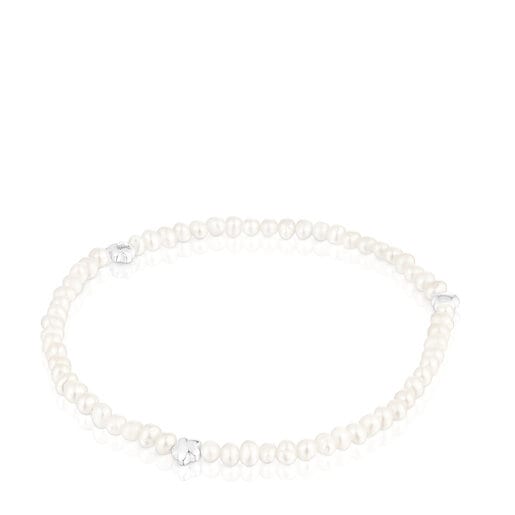 Elastic Bold Motif Bracelet with cultured pearls and flower motifs in silver