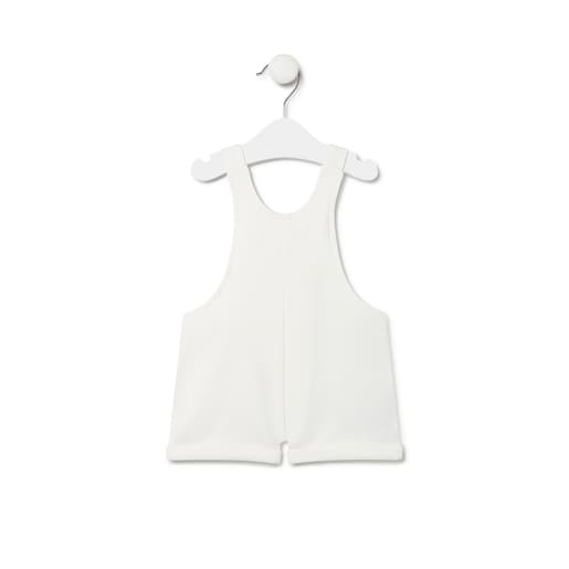 Dungarees-style baby romper in Classic ecru