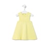 Baby girls dress in Classic yellow