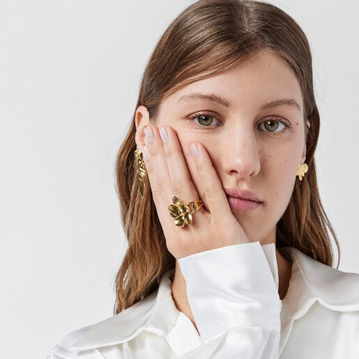 ゴールドコーティングシルバーのフラワーがついたリング Fragile Nature