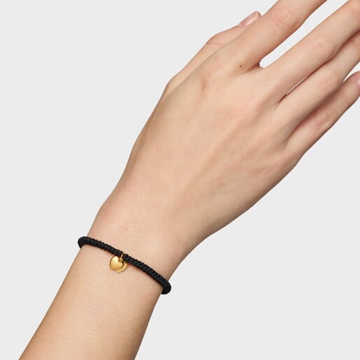 Pulsera de oro 14 kt doble corazón y nylon negro TOUS Flechazo