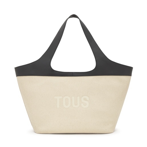 حقيبة أحمال خفيفة كبيرة الحجم من قماش الكانفاس باللونين الأسود والبيج من تشكيلة TOUS Lirio