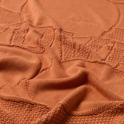 Reversible baby shawl in Nilo orange