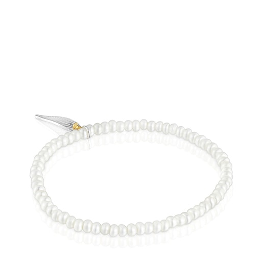 Yunque Elastic Bracelet with cultured pearls and two-tone charm