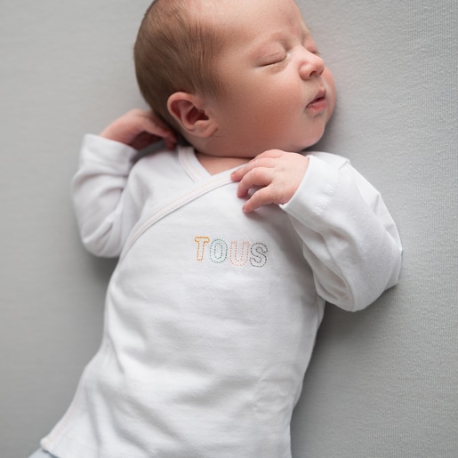 Camiseta de bebé cruzada lisa blanca