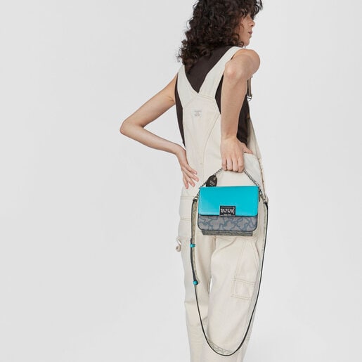 ブラック＆ターコイズカラーのスモールクロスボディバッグ Kaos Legacy