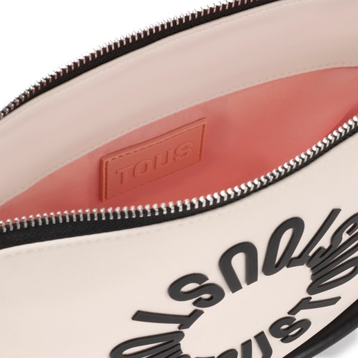 حقيبة متوسطة الحجم بحزام يلتف حول الجسم باللون البيج من تشكيلة TOUS Miranda Soft