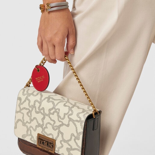 ベージュ＆ブラウンのスモールクロスボディバッグ Kaos Legacy