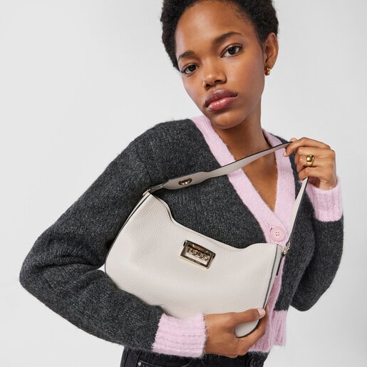 Бежевая кожаная сумка-багет TOUS Legacy