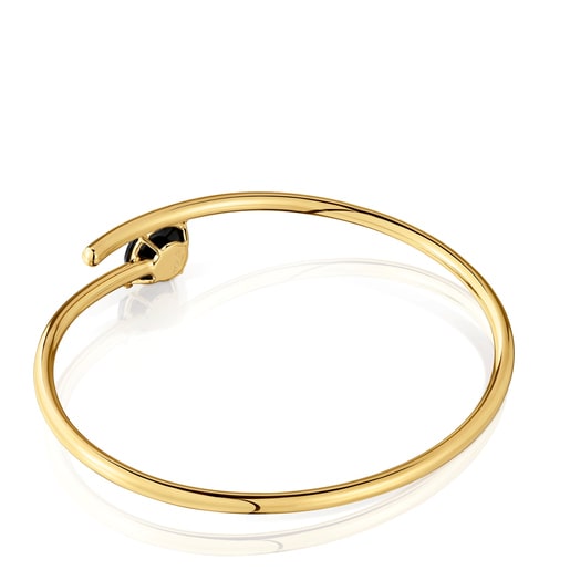 Open bracelet with 18kt gold plating over silver and onyx Cachito Mío