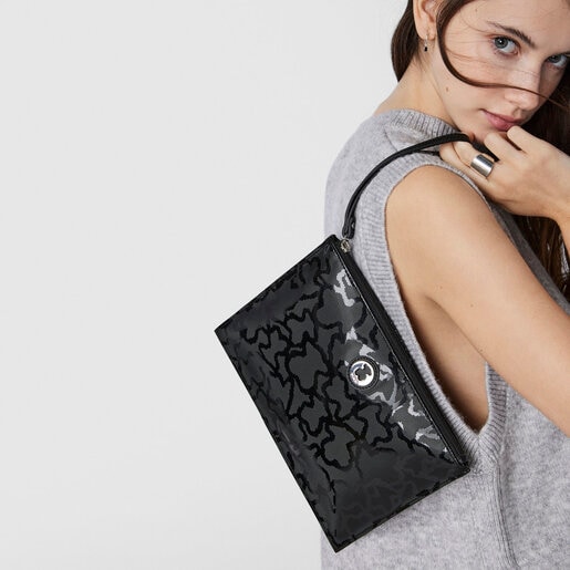 Black colored Kaos Shiny Clutch bag