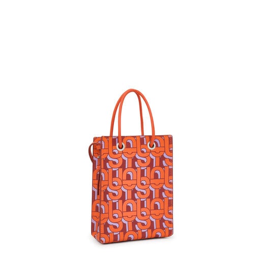 حقيبة صغيرة باللون البرتقالي من تشكيلة TOUS MANIFESTO