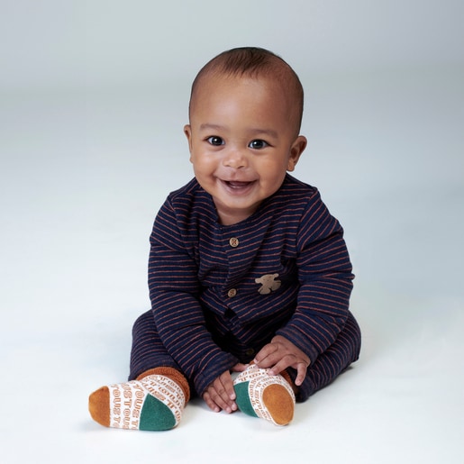 Striped baby playsuit in Blue navy blue