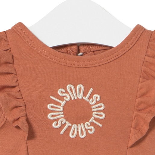 Baby bodysuit with ruffles in Classic brick red