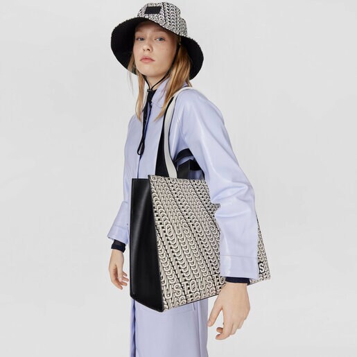 ブラック＆ホワイトのリバーシブル・バケットハット TOUS Vera Doble