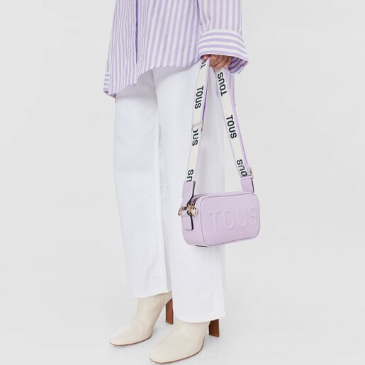 モーブカラーのクロスボディ・レポーターバッグ TOUS La Rue