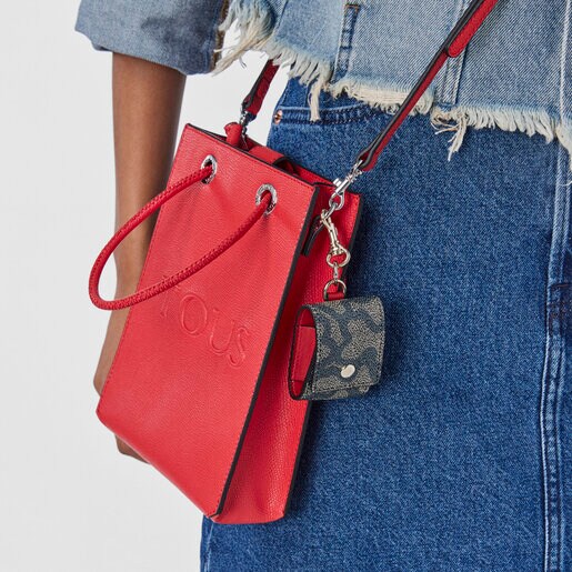 Small black Kaos Legacy hanging Case for AirPods