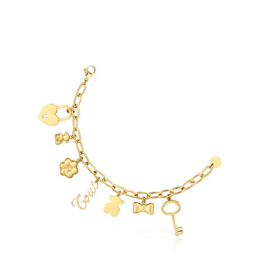 سوار من الصُلب مُرصّع بتمائم معلقة باللون الذهبي من تشكيلة TOUS Charming