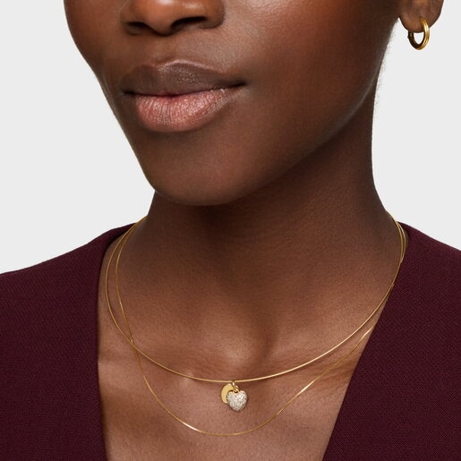 Colgante de oro 14 kt doble corazón y diamantes TOUS Flechazo