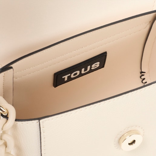 حقيبة ميني بحزام يلتف حول الجسم باللون البيج من تشكيلة TOUS Lucia
