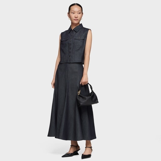 حقيبة بحزام يلتف حول الجسم باللون الأسود من تشكيلة TOUS Hold