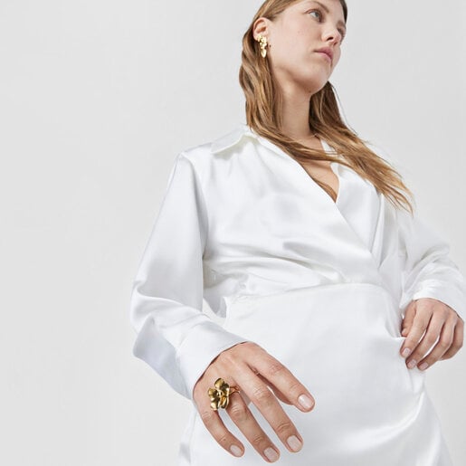 ゴールドコーティングシルバーのフラワーがついたリング Fragile Nature