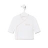 Camiseta de bebé cruzada lisa blanca