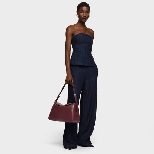 حقيبة كتف باللون العنابي من تشكيلة TOUS City