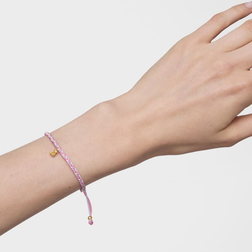 Pulsera oso con baño de oro 18 kt sobre plata y nylon rosa/blanco TOUS Motivos
