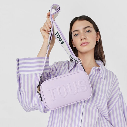 モーブカラーのクロスボディ・レポーターバッグ TOUS La Rue