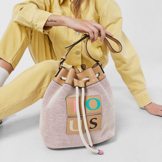 ピンクのバケツバッグ TOUS Yummy