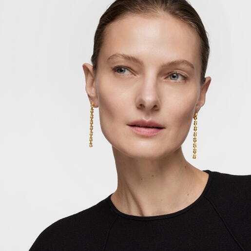 Pendientes largos de acero en color dorado con motivos oso Carrusel