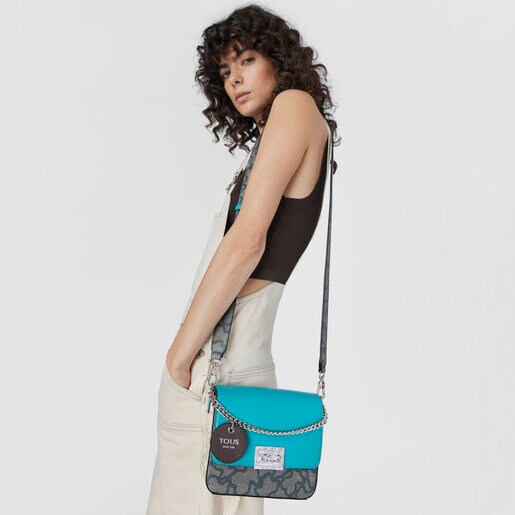 ブラック＆ターコイズカラーのスモールクロスボディバッグ Kaos Legacy