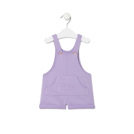 Dungarees-style baby romper in Classic lilac