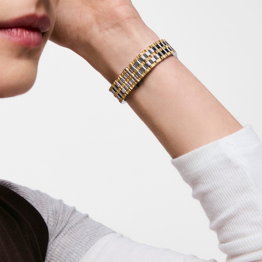 ساعة تناظرية بسوار من الصُلب باللونين الذهبي والفولاذي من تشكيلة TOUS 1950