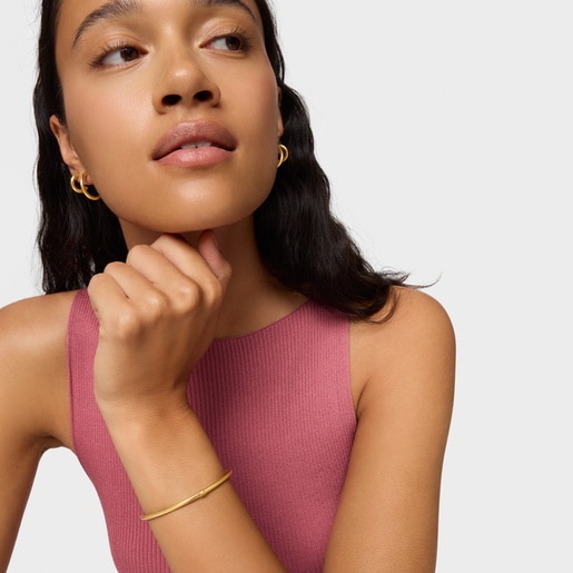 Bangle with 18kt gold plating over silver Hold