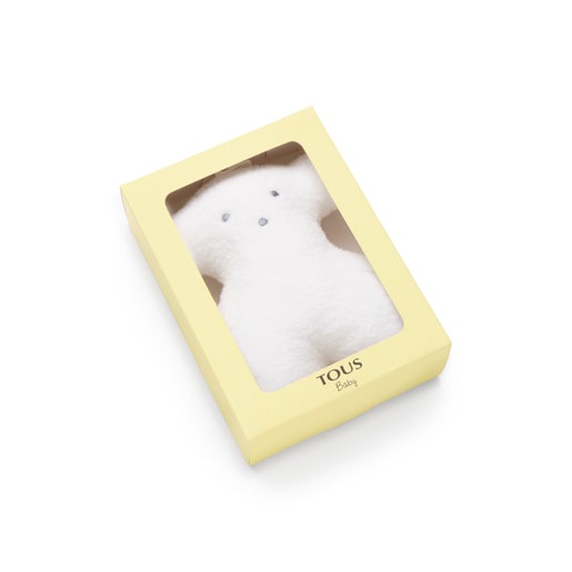 White curly-haired musical bear