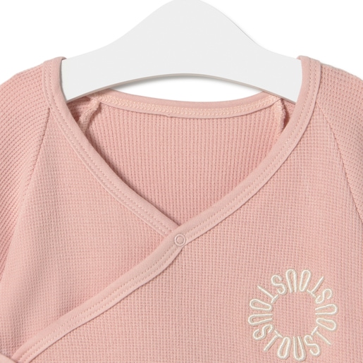 Wrap-over baby playsuit in Classic pink