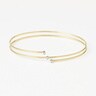 Pulsera espiral de oro con tres diamantes TOUS ATELIER