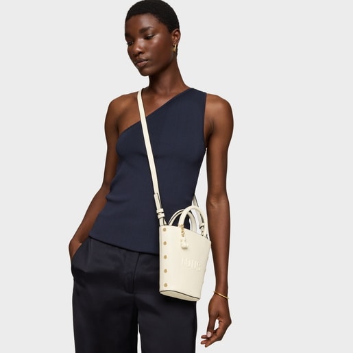 حقيبة ميني صغيرة من TOUS باللون البيج من تشكيلة Back to basics