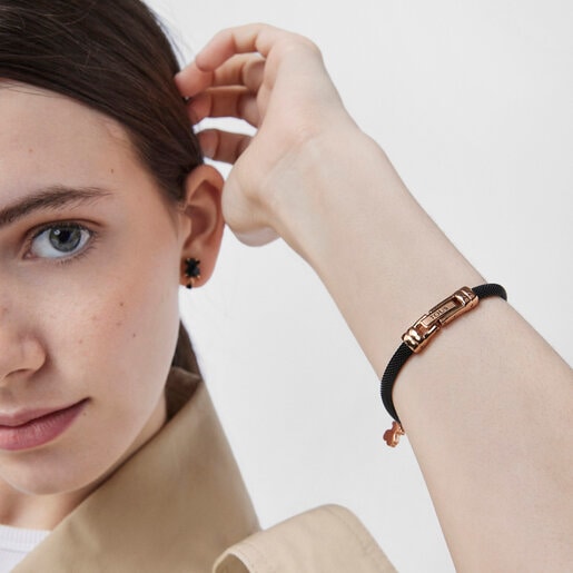 Reloj analógico Hold de acero IP rosado con correa de acero IP negro