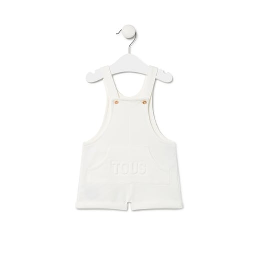 Dungarees-style baby romper in Classic ecru